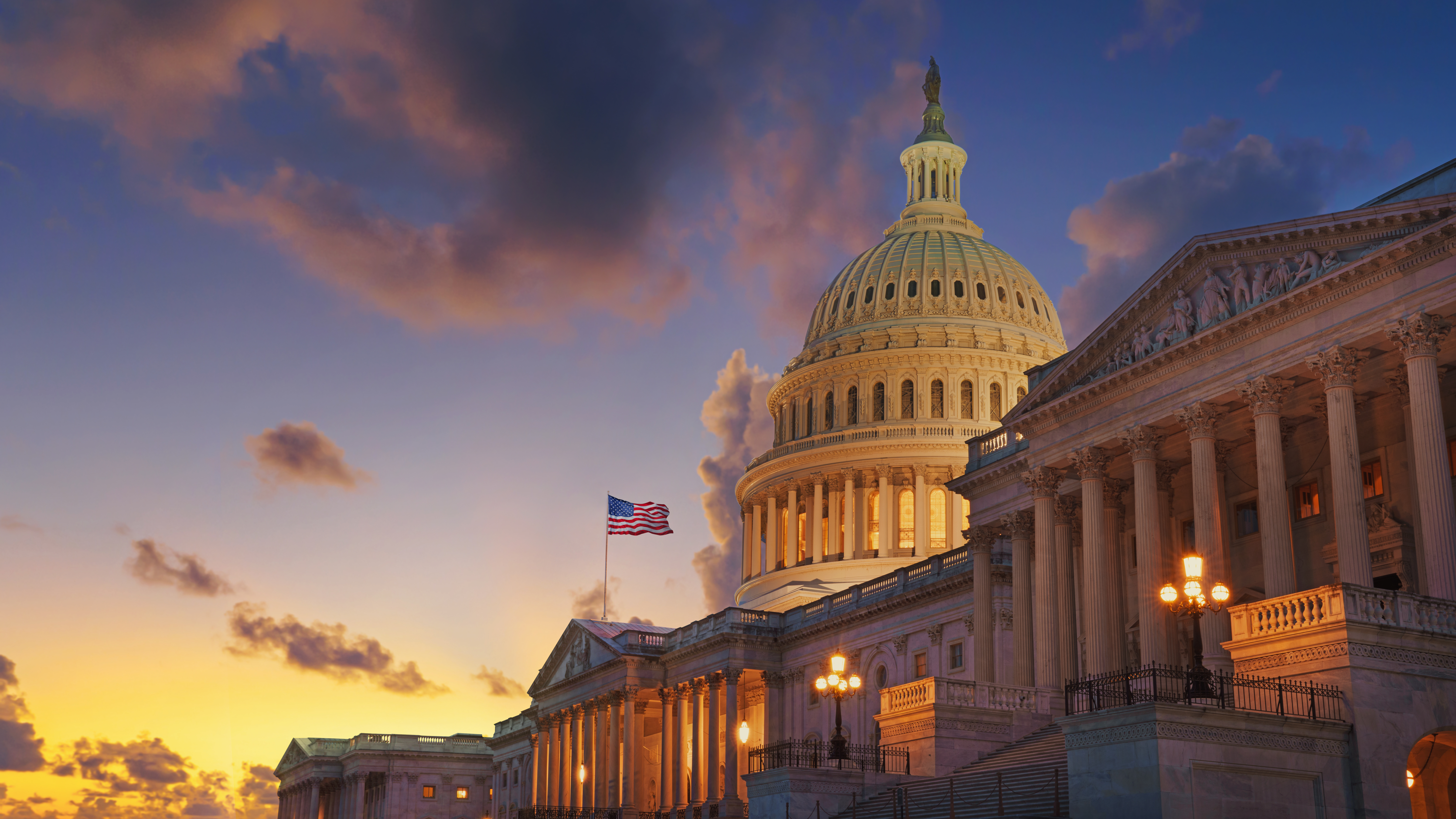 Legislative building with sunset backdrop