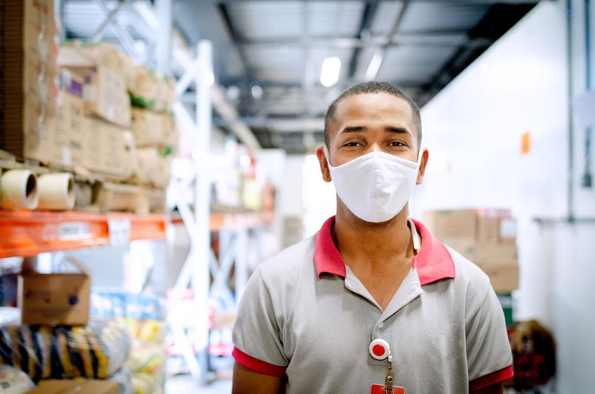 Warehouse worker wearing face mask